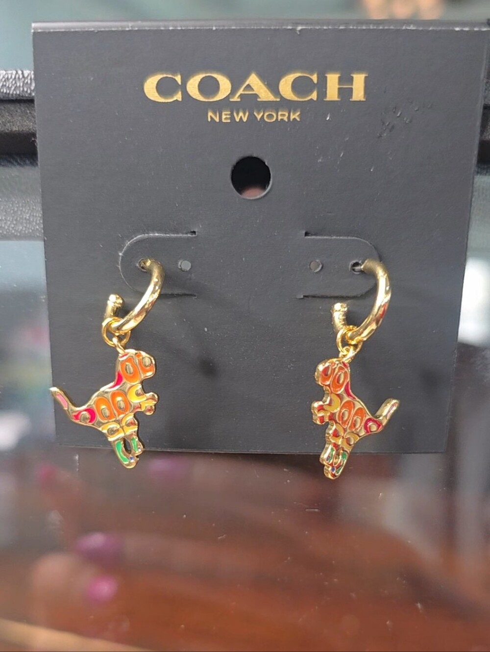 Coach Gold-Tone Hoop Earrings with Multicolor Dinosaur Charms - Picture 4 of 5